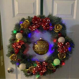 Festive Holiday Wreath with Red and Gold Accents